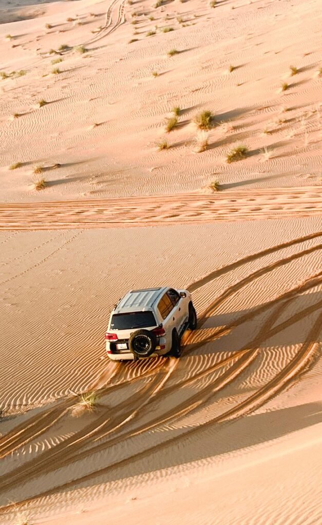4x4 vehicle on a thrilling desert safari in Abu Dhabi's Sweihan dunes.